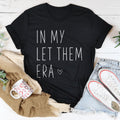 In My Let Them Era Tee
